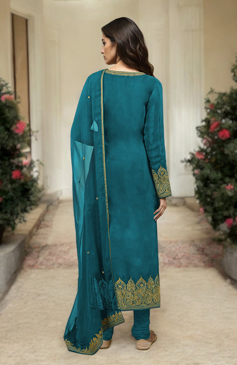 Peacock blue kurta set with gold Kashmiri tilla aari embroidery.