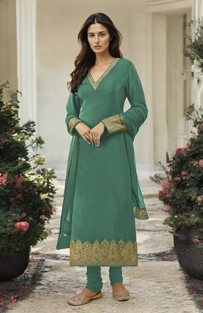 Jade green kurta set with gold Kashmiri tilla aari embroidery.