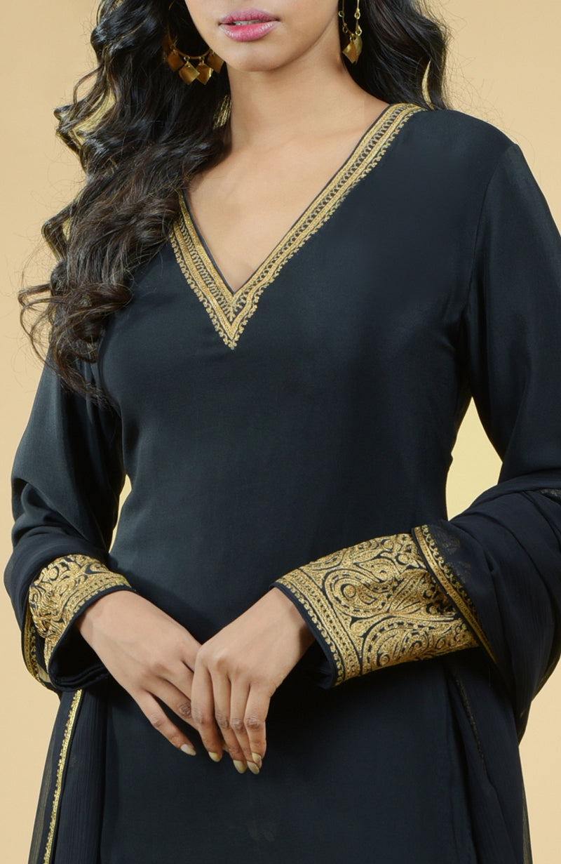 Black gold Kashmiri Tilla Aari embroidered kurta set with a V-neck and long sleeves.