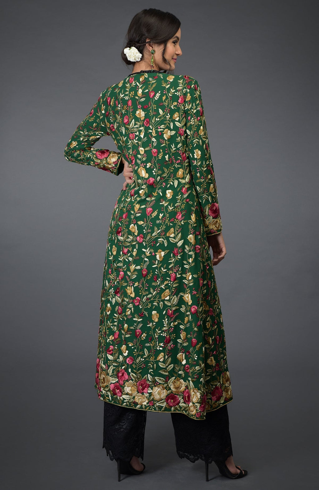 Emerald green georgette jacket with Parsi Gara floral embroidery and beige crepe flared skirt.