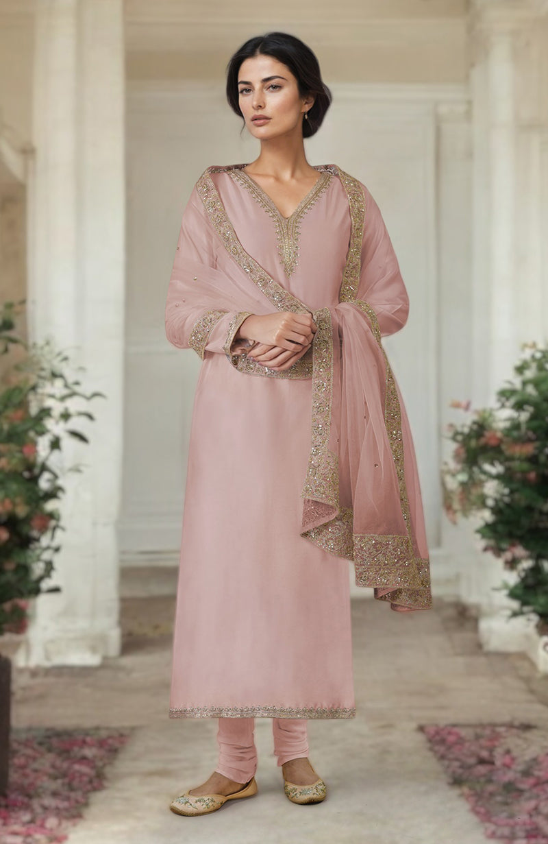 Oyster pink kurta set with gold marori and zardozi hand embroidery.
