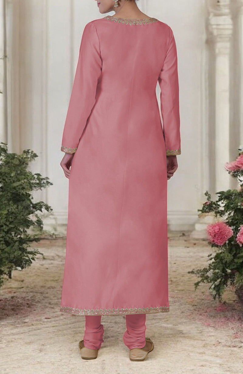 A woman from behind wears a withered rose kurta set with gold embroidery.