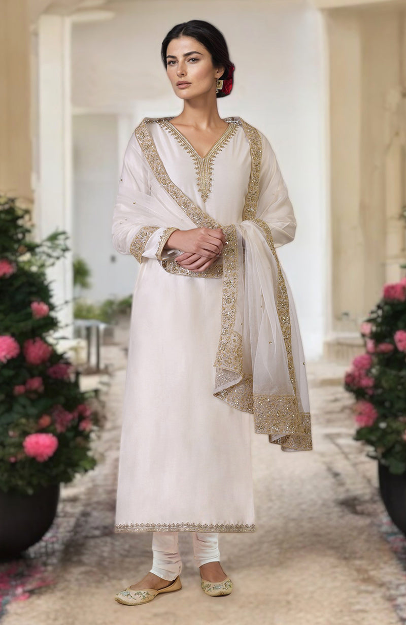 Oyster pink kurta set with gold marori and zardozi hand embroidery.