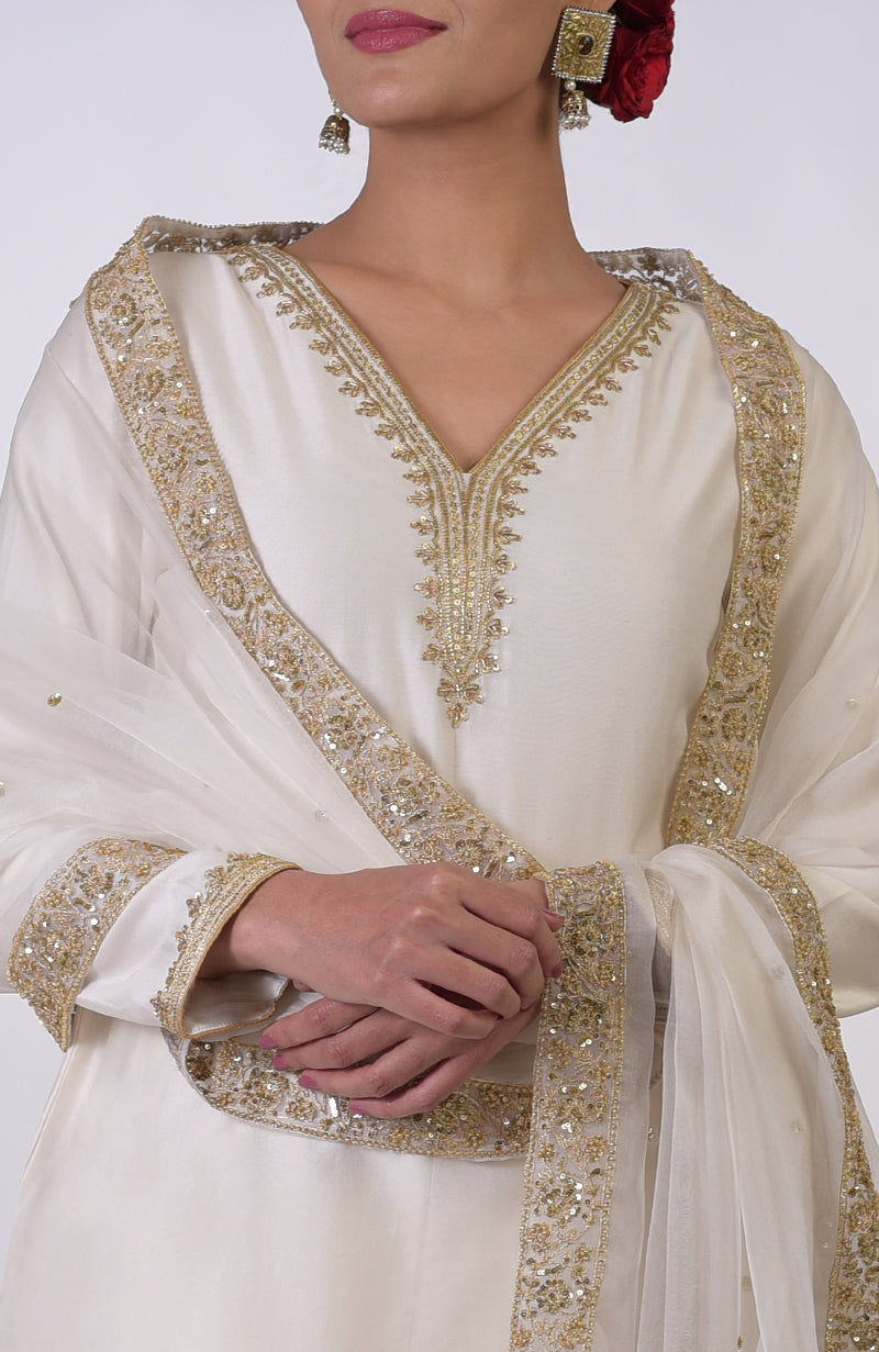 Ivory kurta set with gold marori and zardozi hand embroidery.