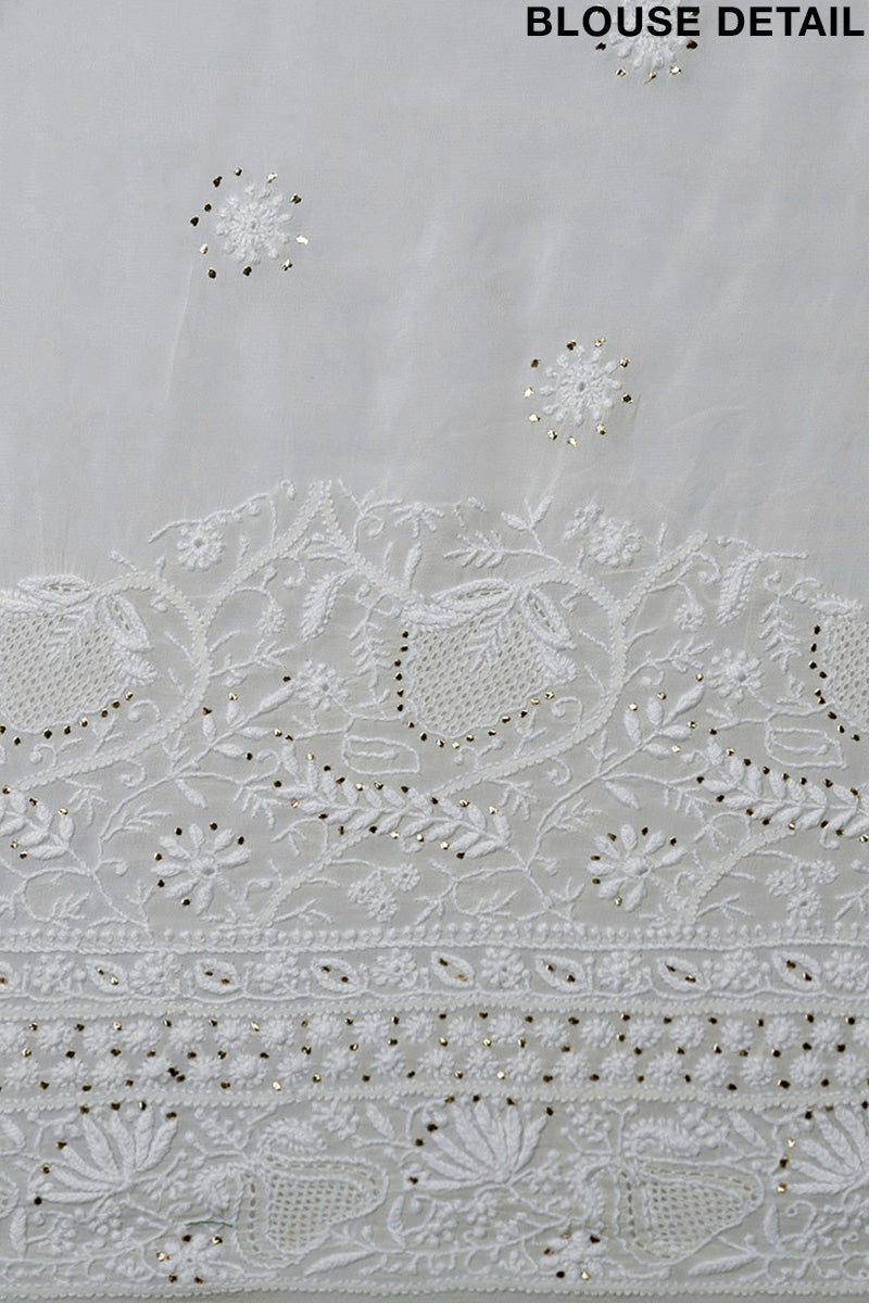 Ivory Georgette saree with hand-embroidered Chikankari, kamdani, and rose gold gota patti borders.