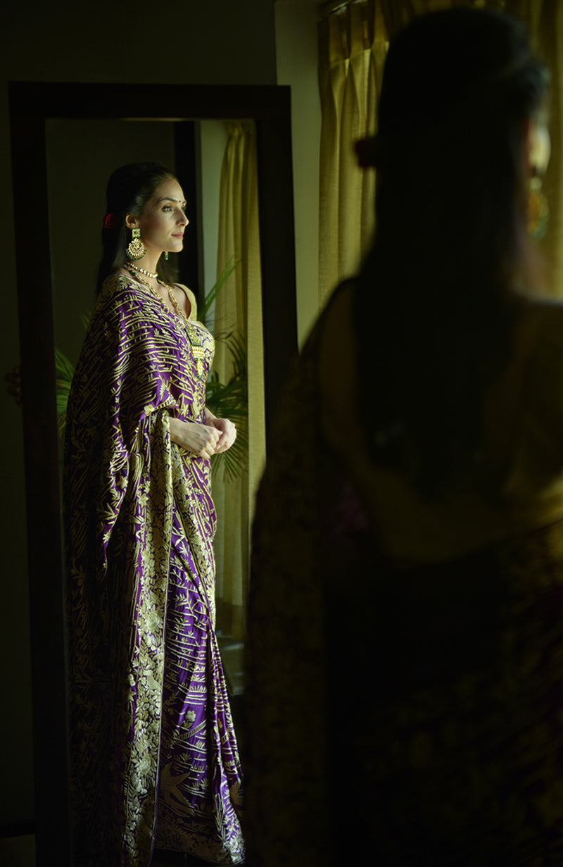 Purple satin silk saree with beige hand embroidered birds and floral Parsi Gara design