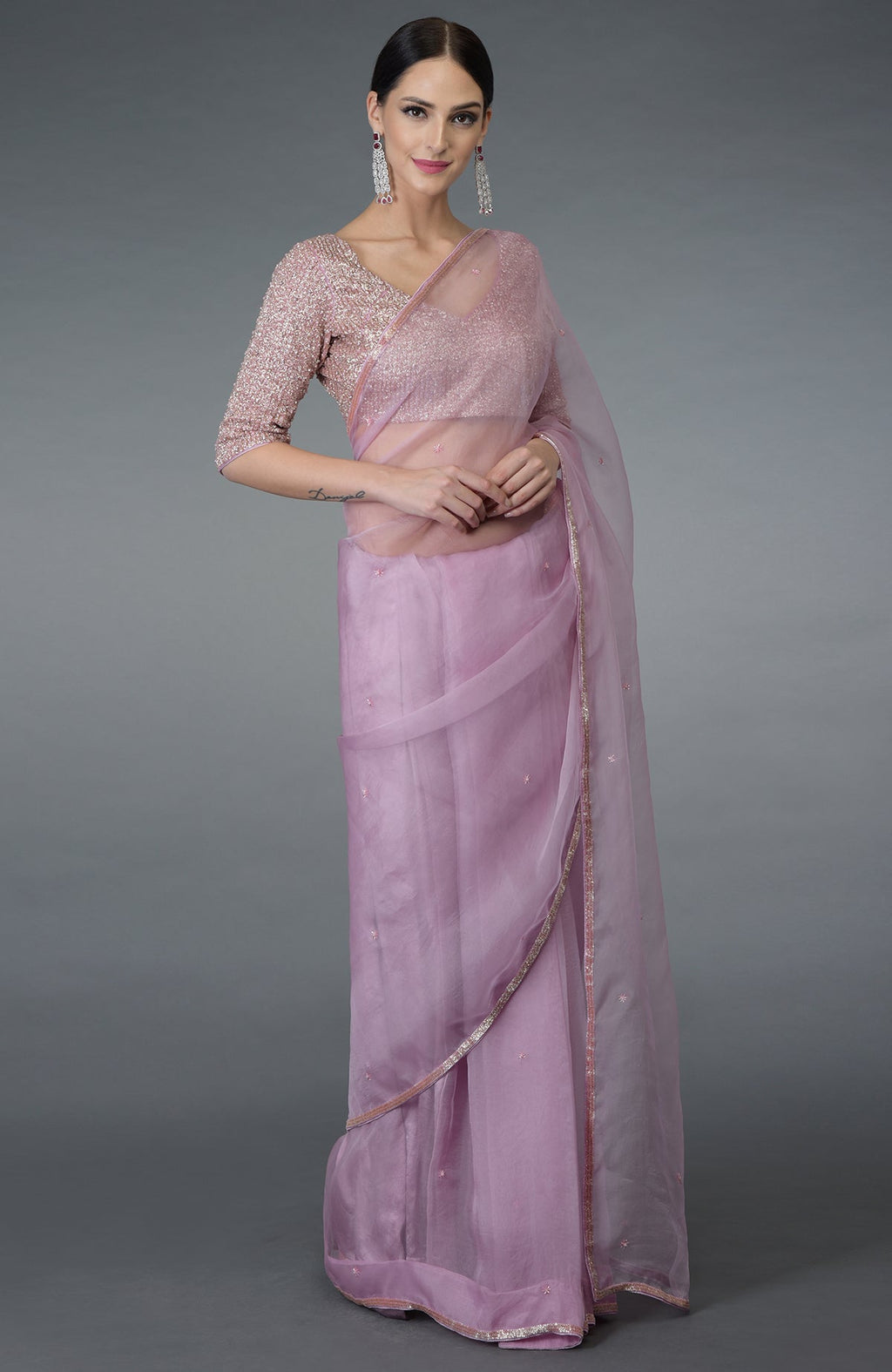 Lilac silk organza saree with a beads hand-embroidered blouse.