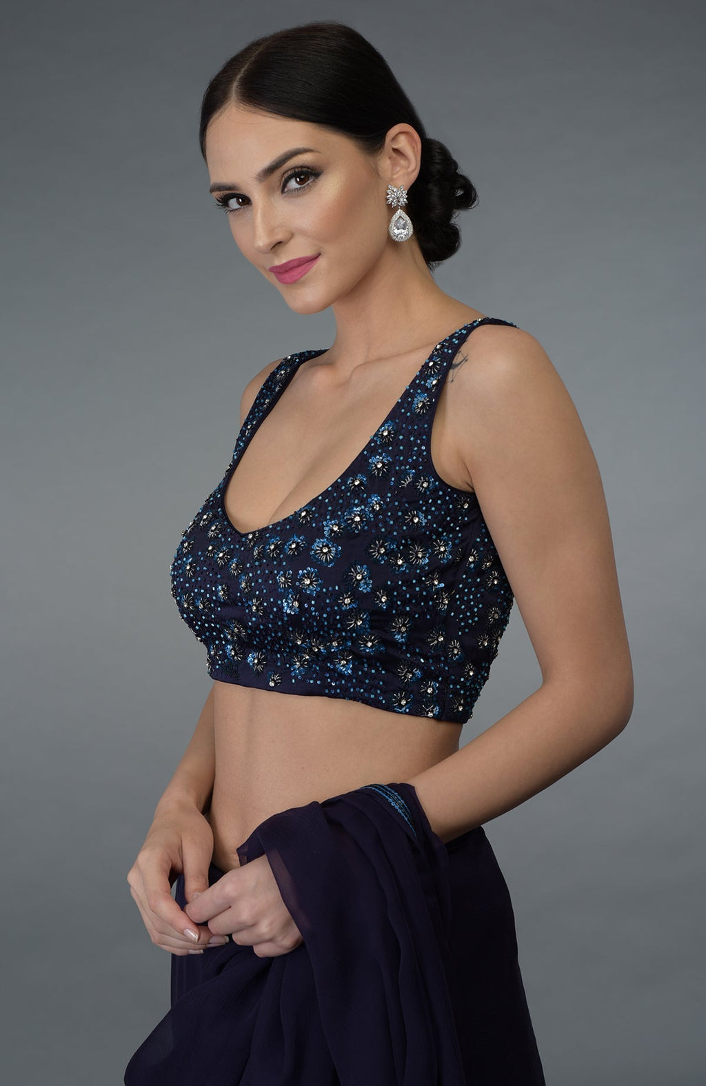 Eclipse Blue crystal sequin and beads work saree with a matching blouse.
