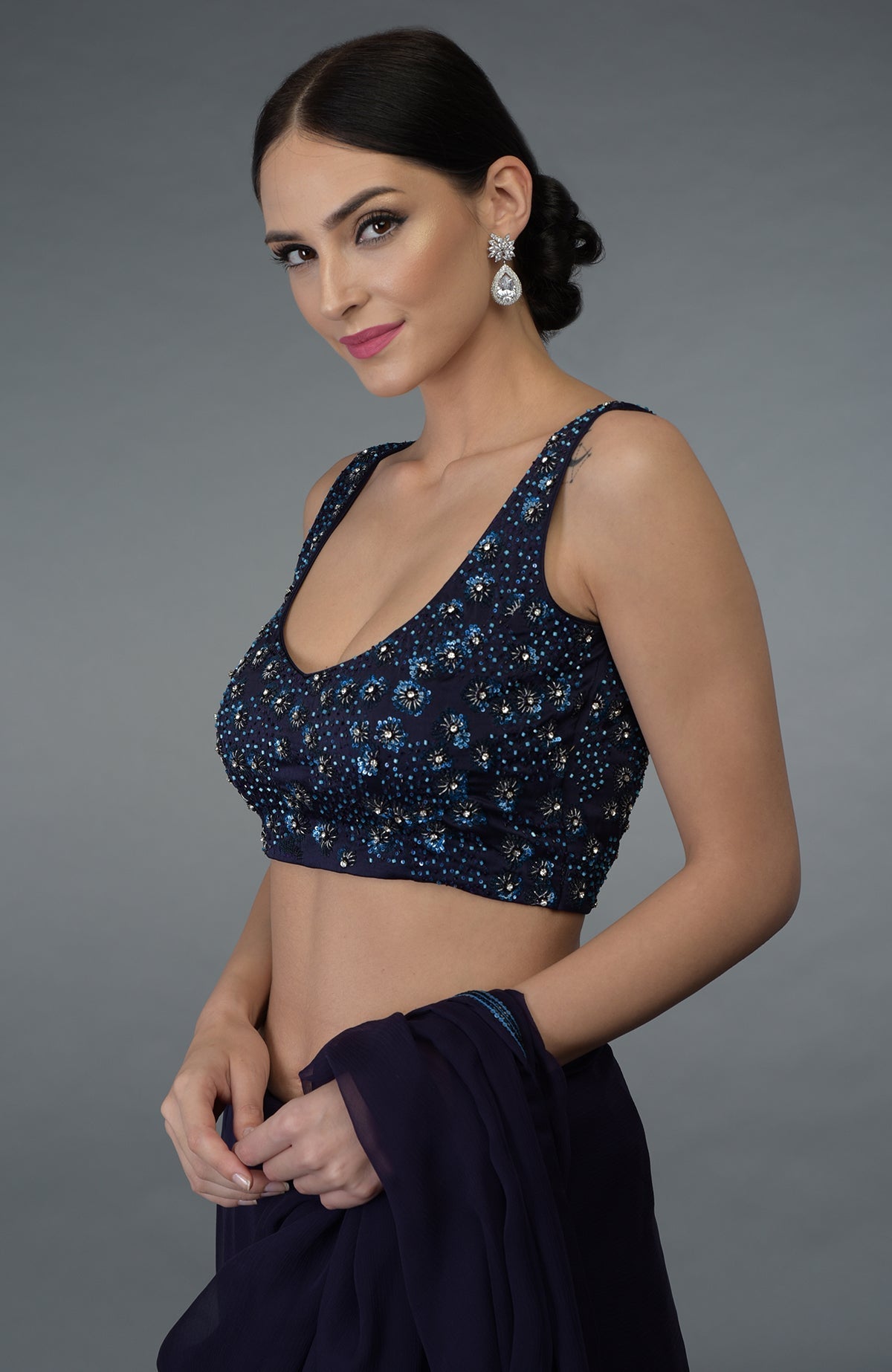 Eclipse Blue crystal sequin and beads work saree with a matching blouse.