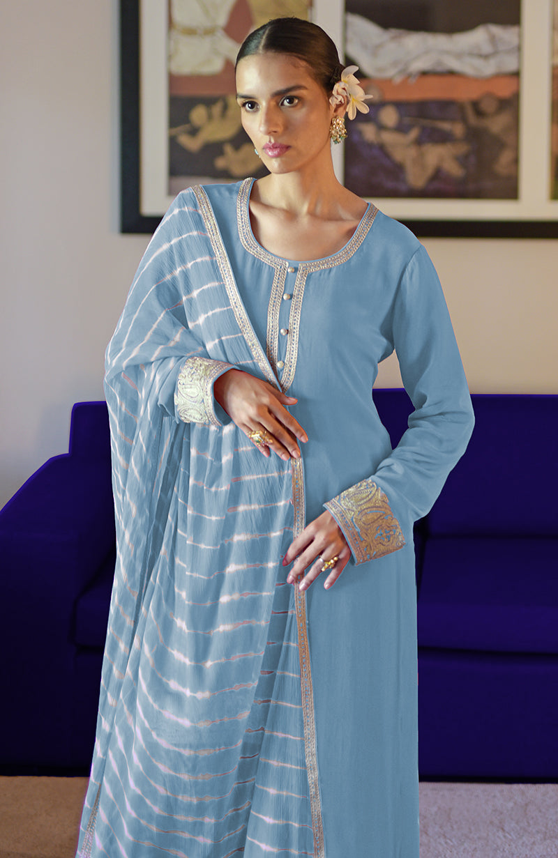 Cerulean blue kurta set with Kashmiri tilla embroidery and a leheriya tie-dye dupatta.