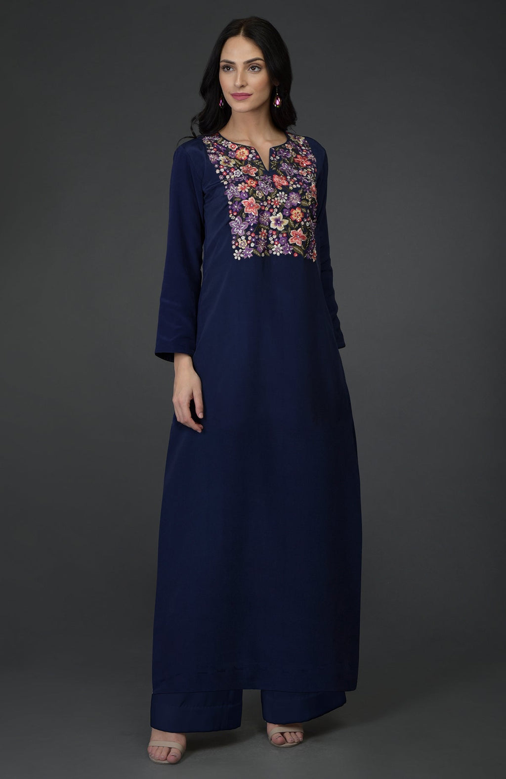 An Eclipse Blue kurta set with colorful floral embroidery on the yoke.