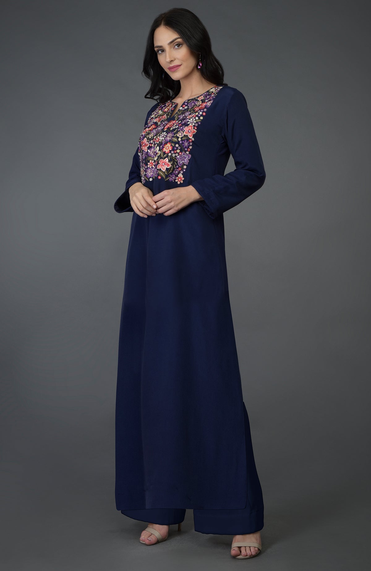 An Eclipse Blue kurta set with floral resham, sequin, and bead embroidery.