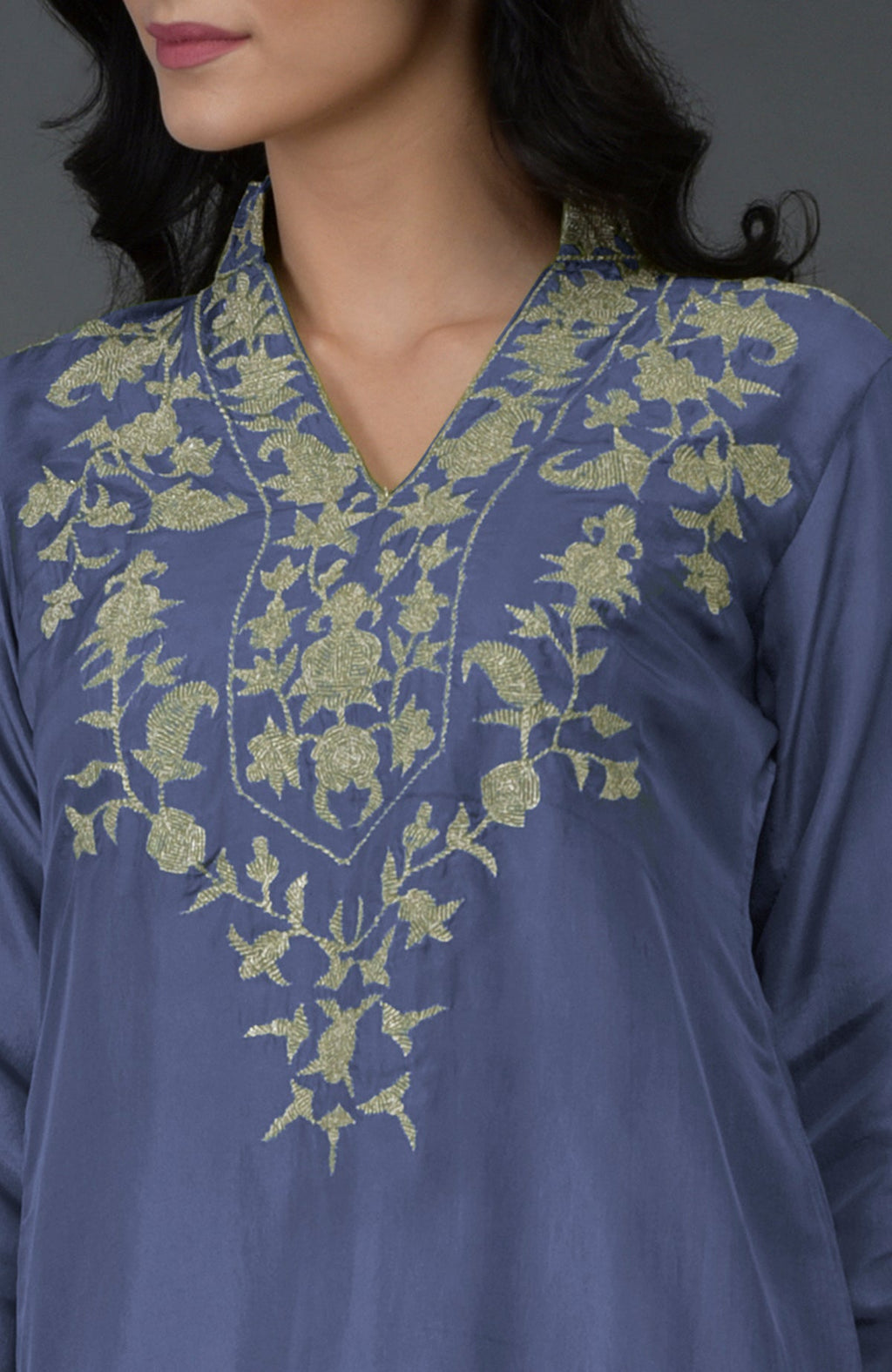 An iris blue Kashmiri tilla embroidered kurta set with a V-neck and long sleeves.