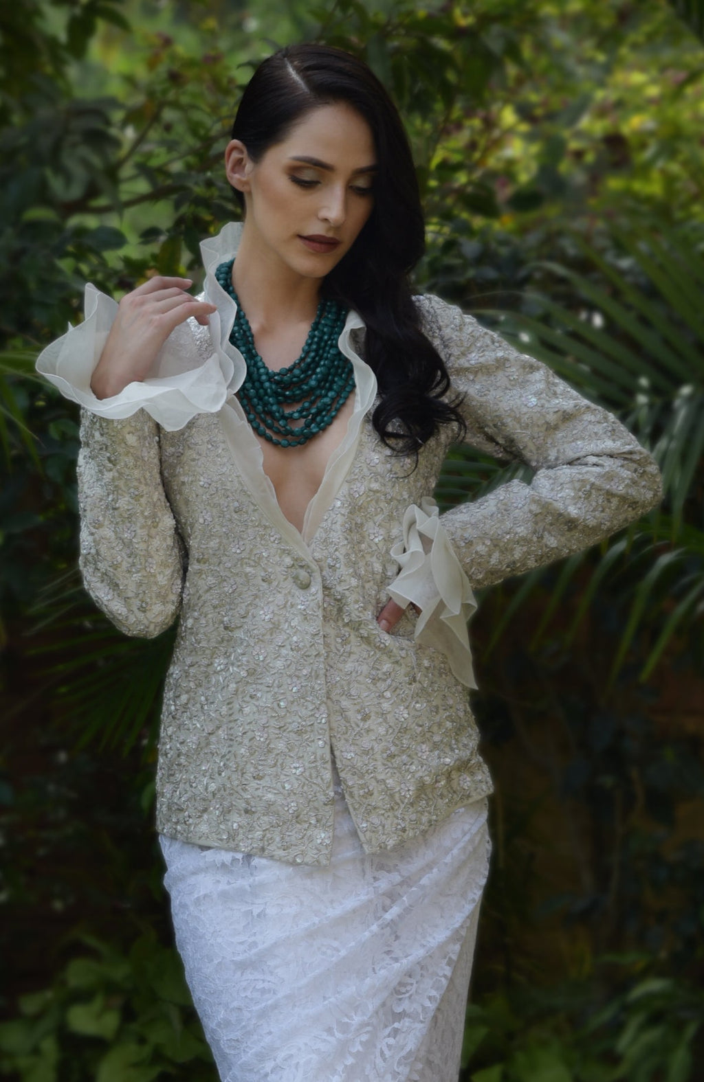 White frost sequin and French wire hand-embroidered jacket with a ruffled collar.