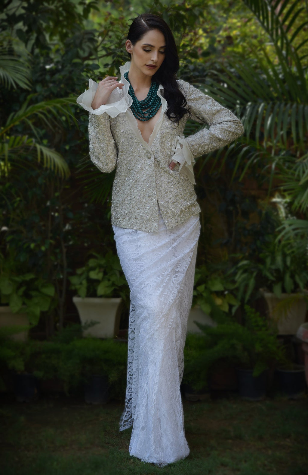 Frost sequin beads and French wire jacket with a white lace saree.