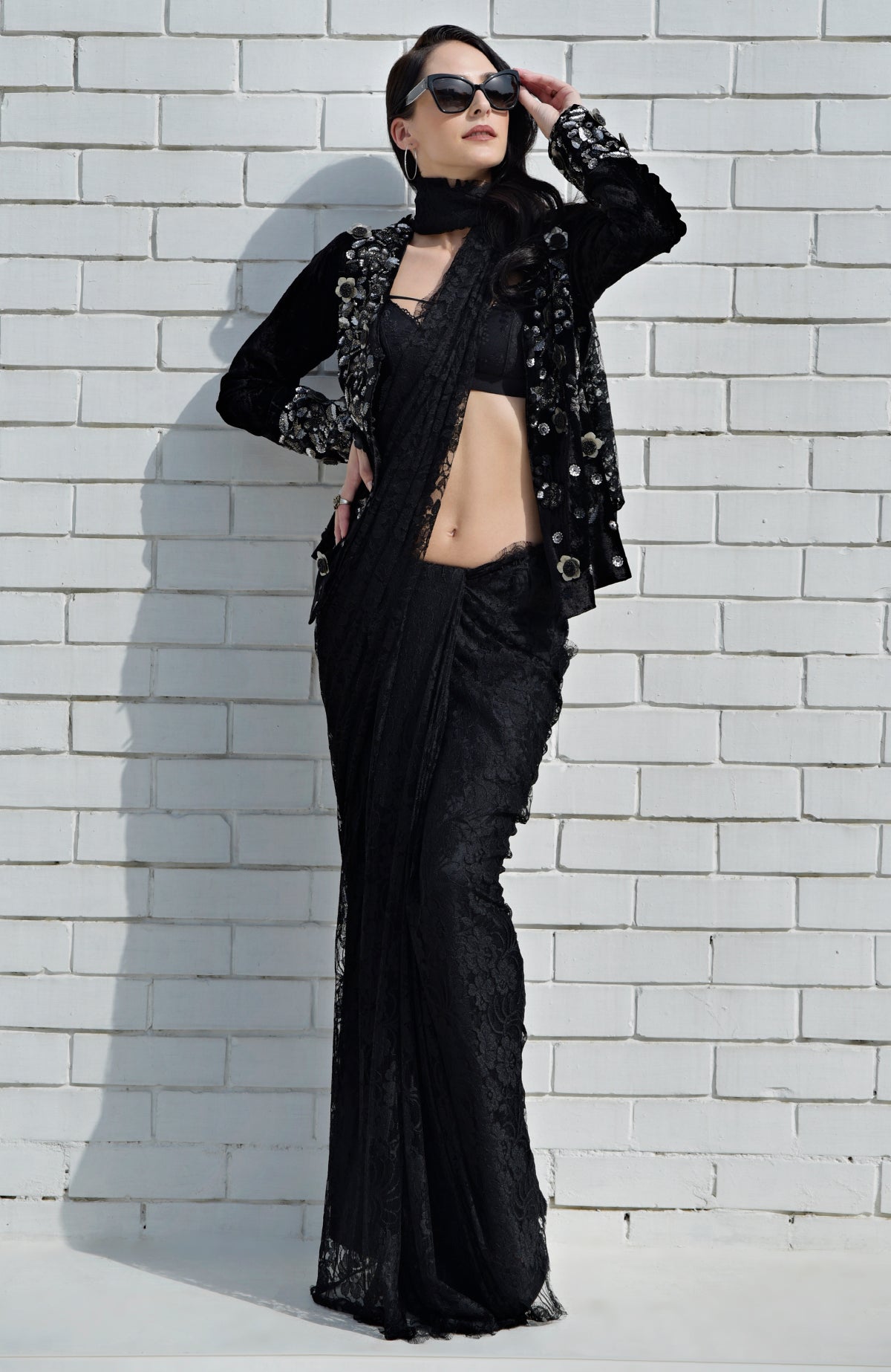 Black velvet jacket with metallic floral beads and sequin embroidery.