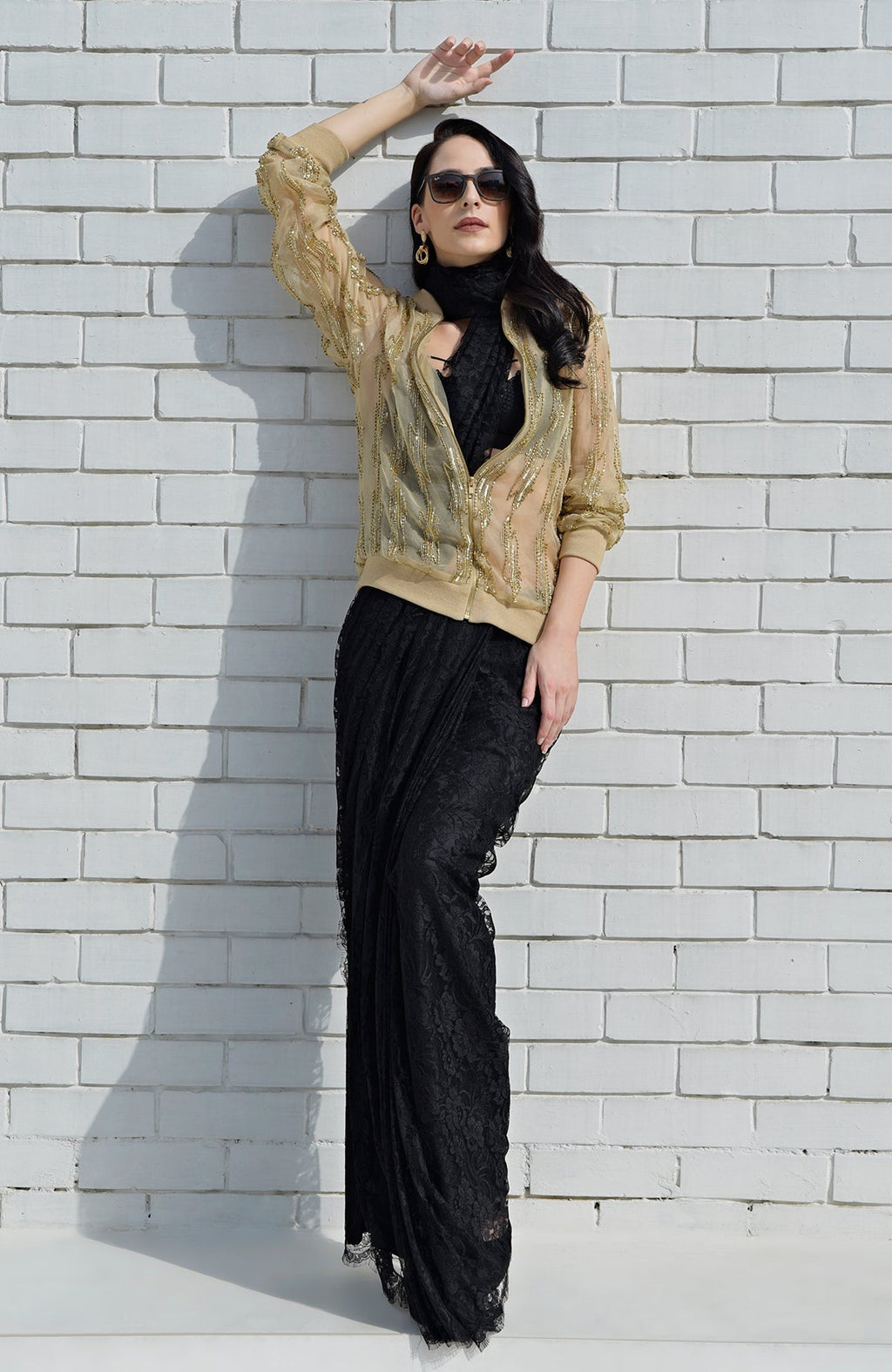 Electric Eye Beads & Sequin Hand Embroidered Jacket on a woman over a black saree.