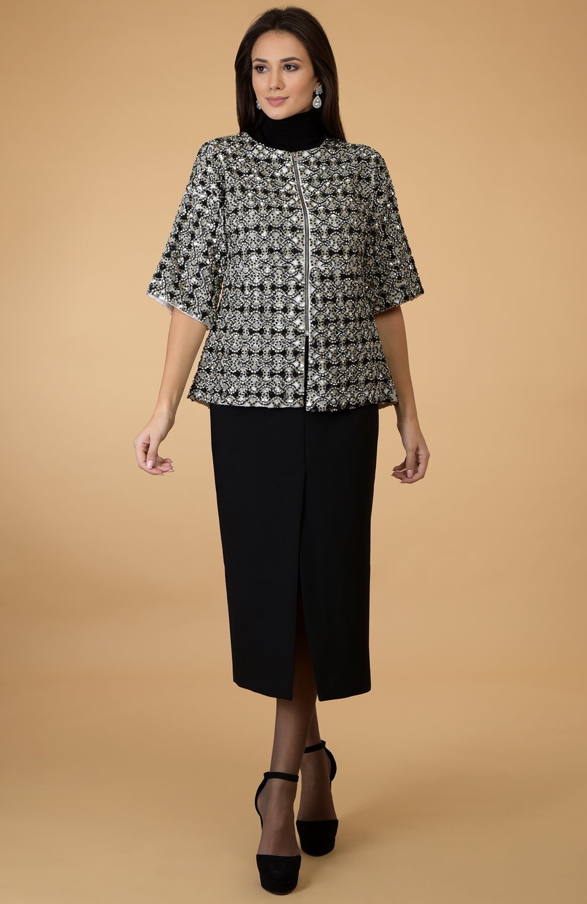 Black empire crystal beads and sequin hand-embroidered jacket with a black skirt.