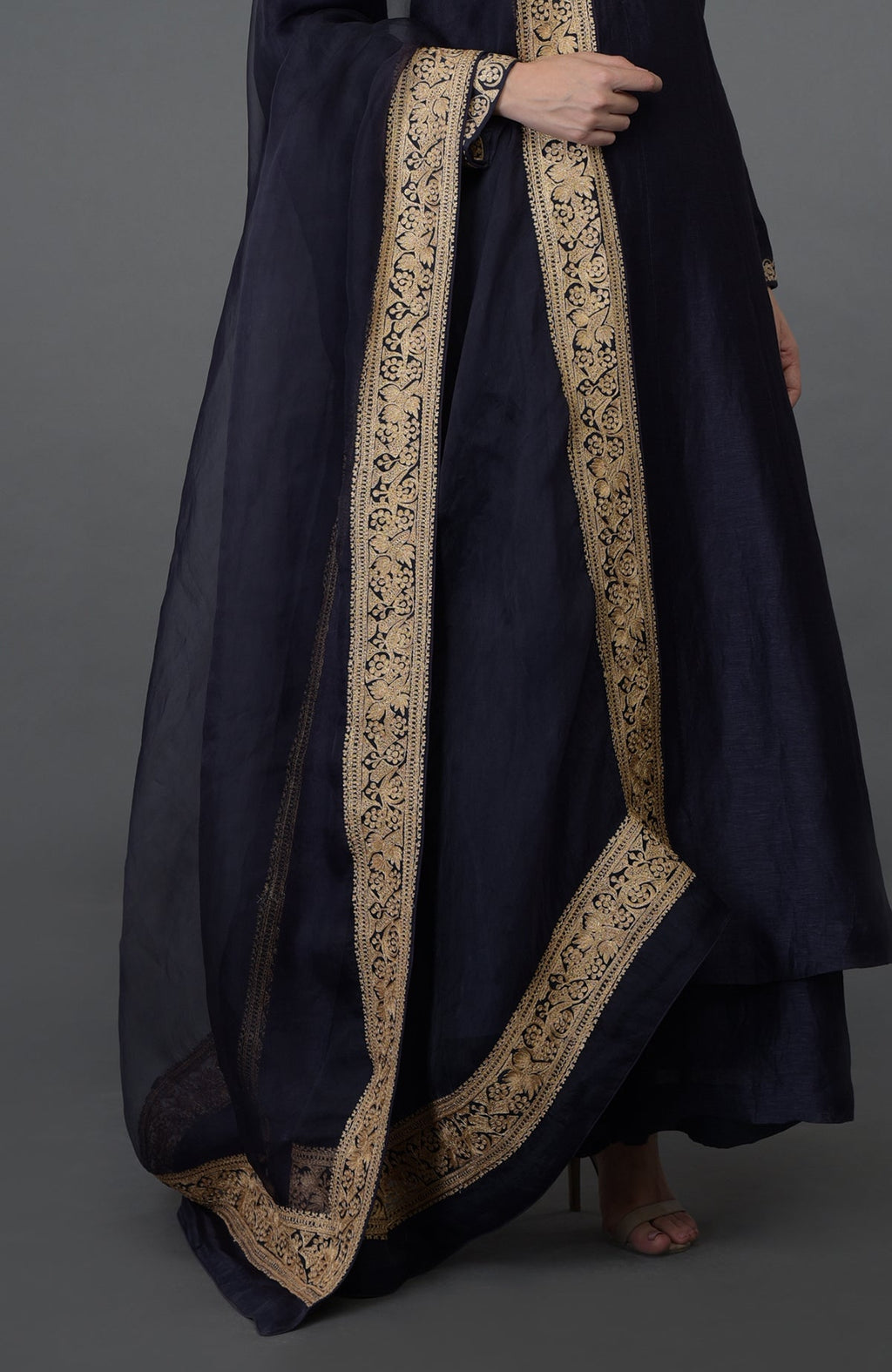 Eclipse blue suit with gold tilla embroidery on the kurta and dupatta.