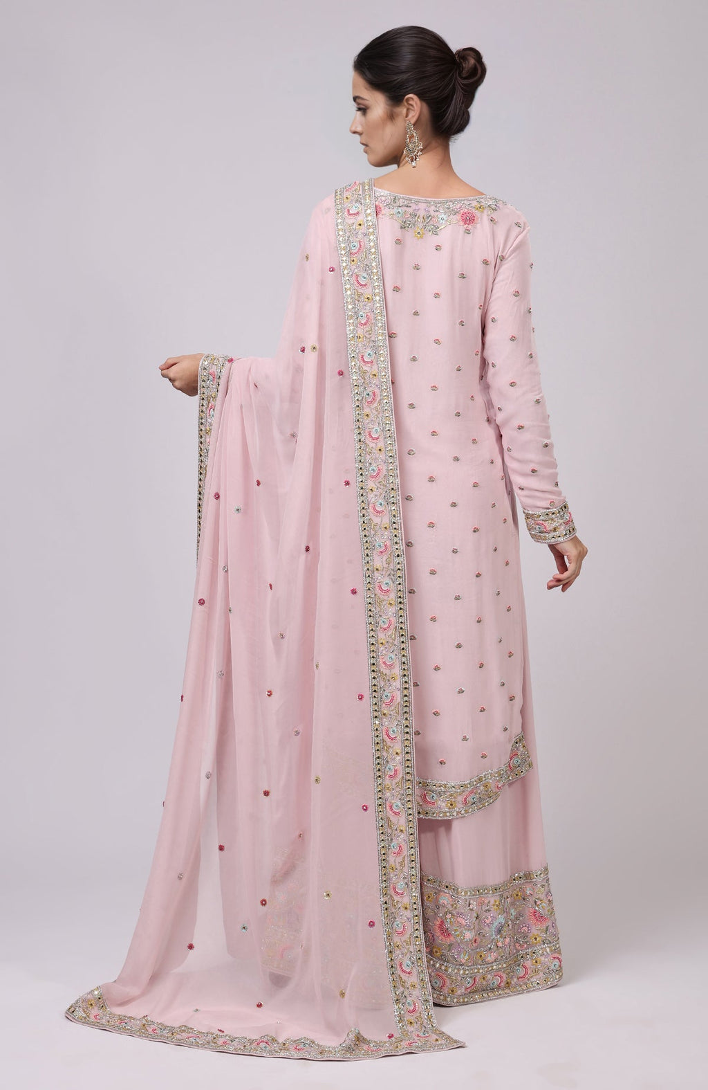 Marshmallow pink sharara set with resham and zardozi hand embroidery.