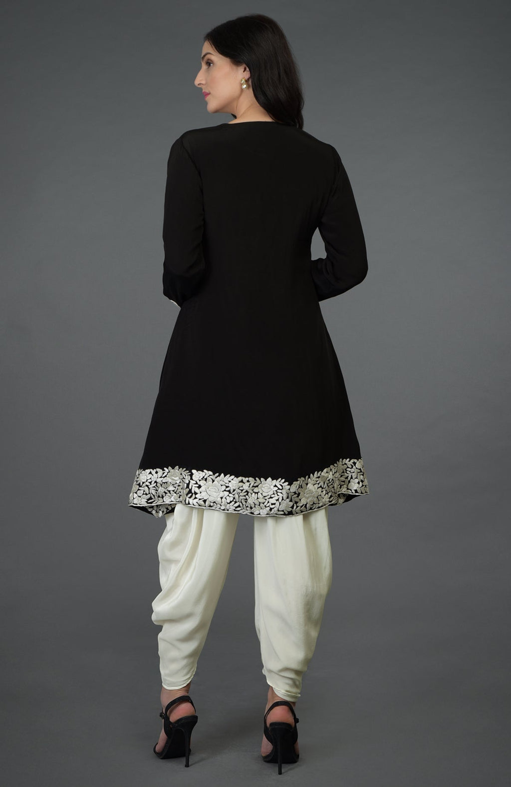 Black kurta with ivory Parsi Gara embroidery paired with ivory cowl Patiala pants.