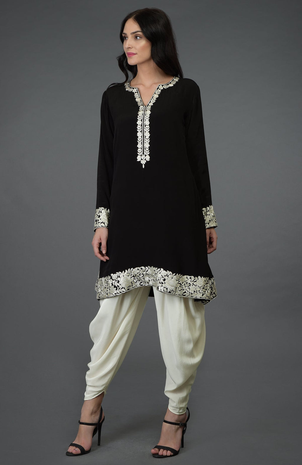 Black kurta with ivory Parsi Gara embroidery paired with ivory cowl Patiala pants