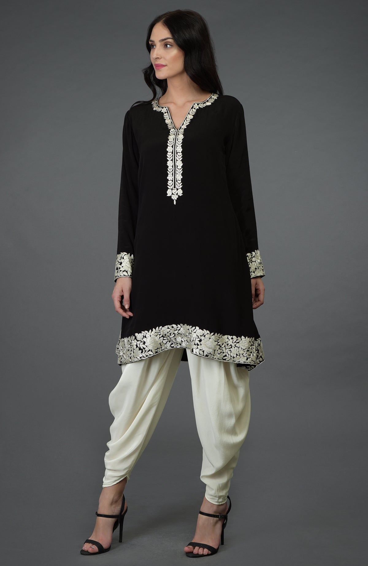 Black kurta with ivory Parsi Gara embroidery paired with ivory cowl Patiala pants
