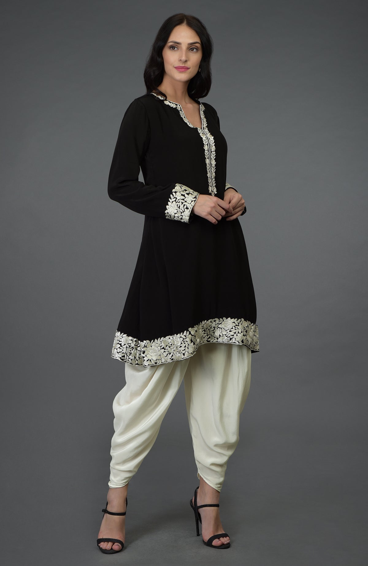 Black kurta with ivory Parsi Gara embroidery paired with ivory cowl Patiala pants