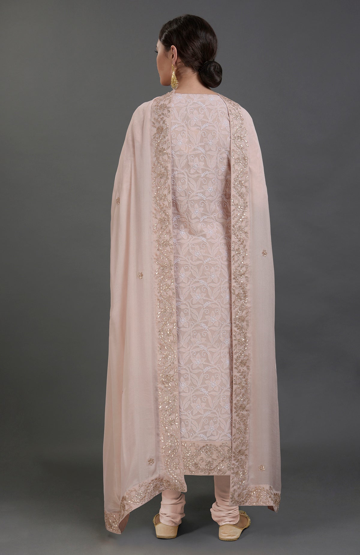 Oyster pink chikankari kurta set with gota patti embroidery and matching churidar.