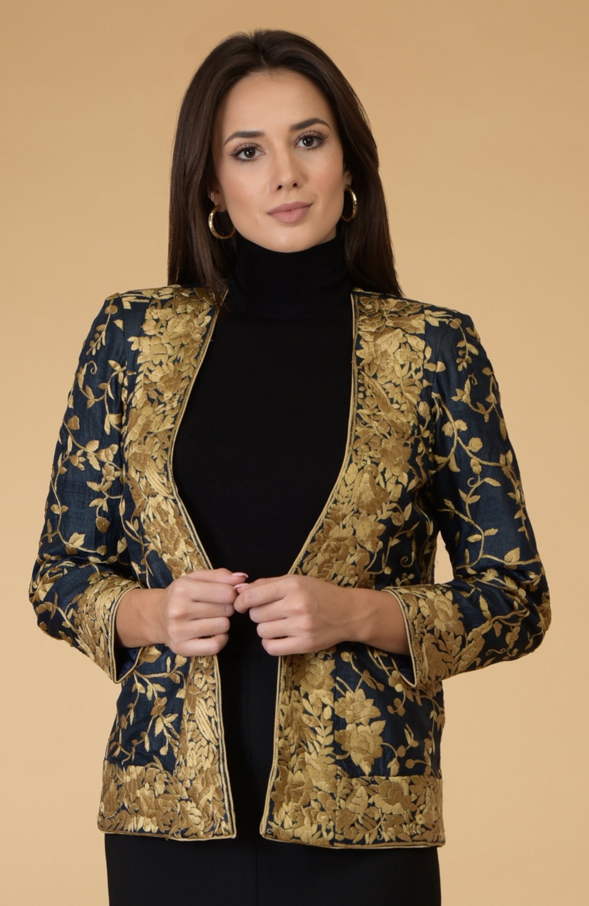 Midnight blue Parsi Gara embroidered shrug jacket with gold floral and bird motifs.