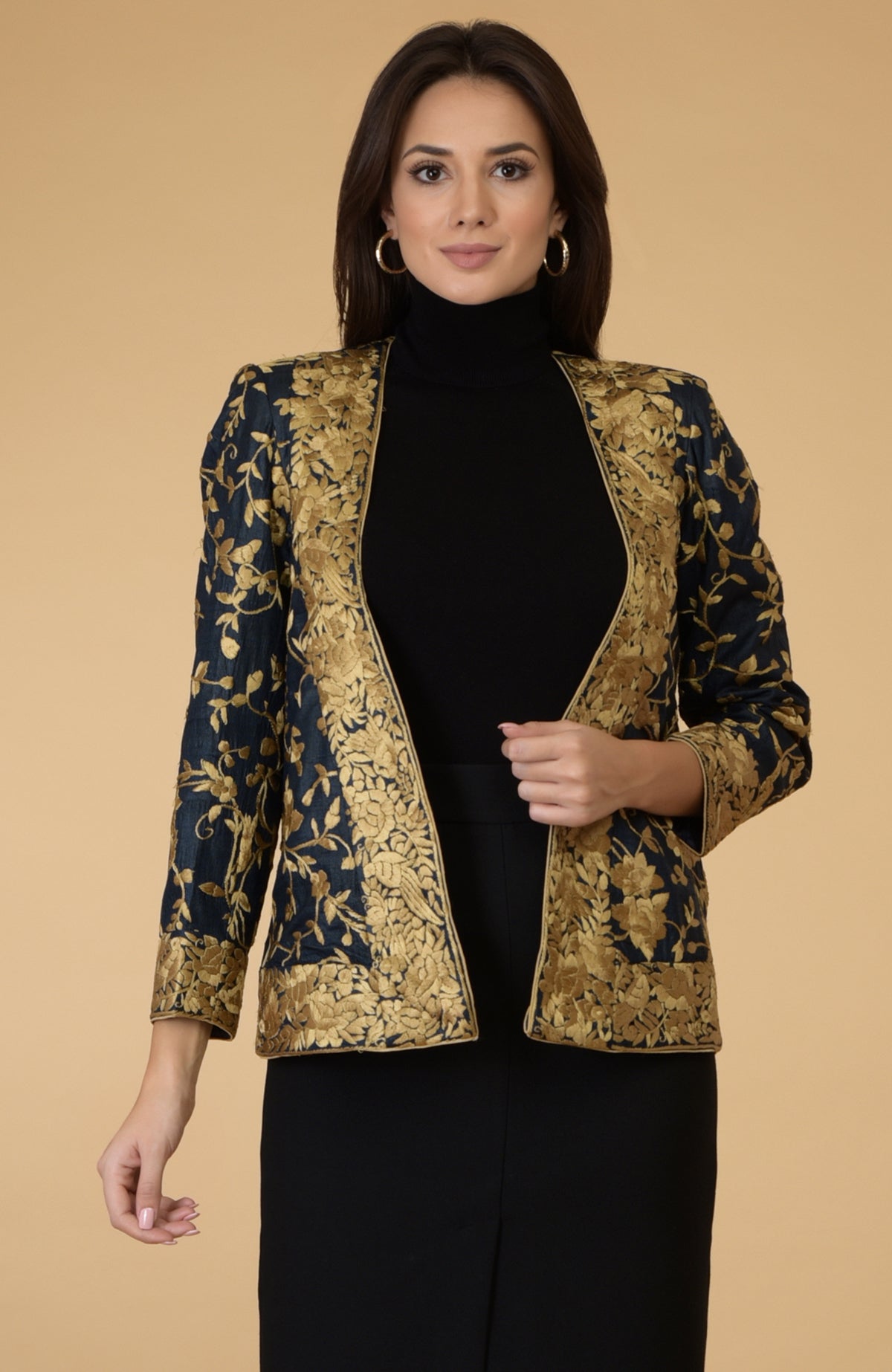Midnight blue Parsi Gara embroidered shrug jacket with gold floral and bird patterns.