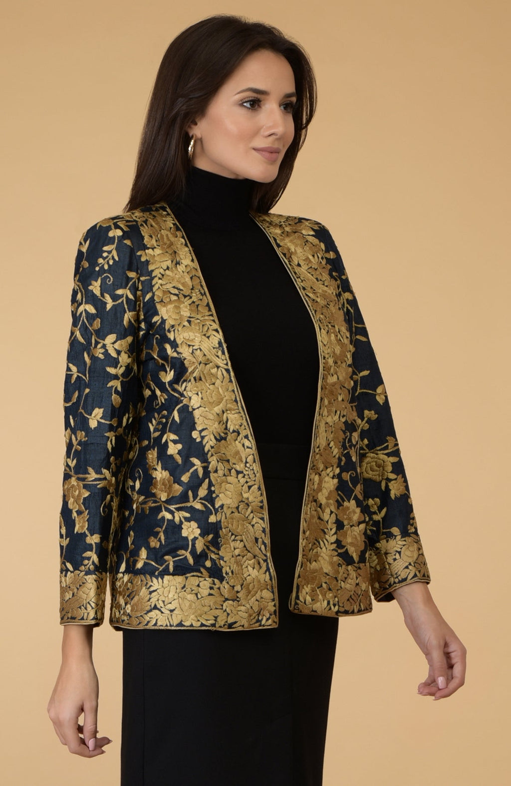 Midnight blue Parsi Gara embroidered shrug jacket with gold floral and bird motifs.