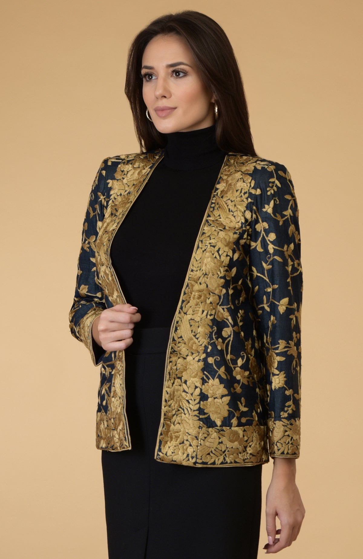 Midnight blue Parsi Gara embroidered shrug jacket with gold floral and bird patterns.