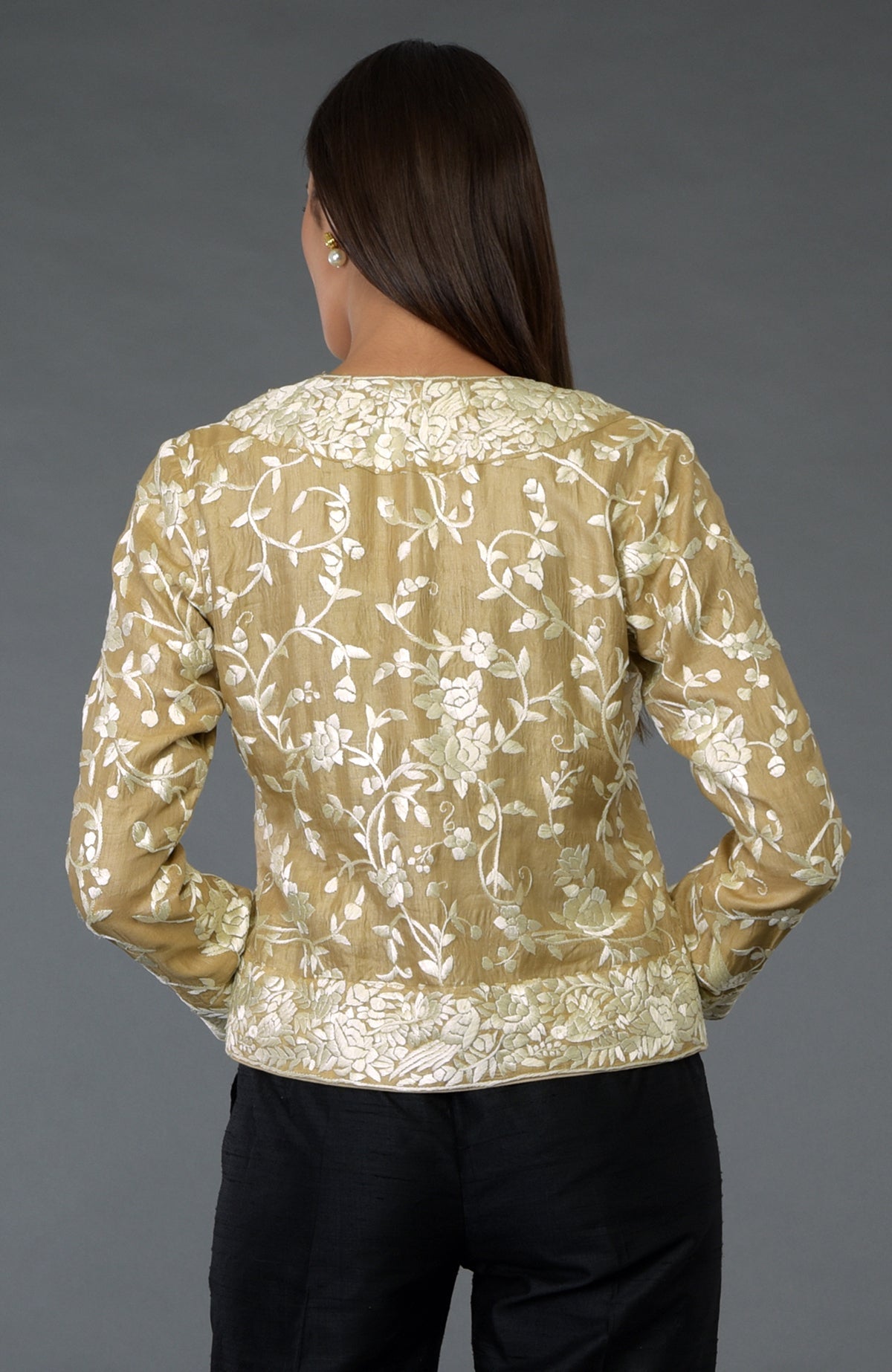 Fawn Parsi Gara embroidered jacket with ivory floral and bird patterns.