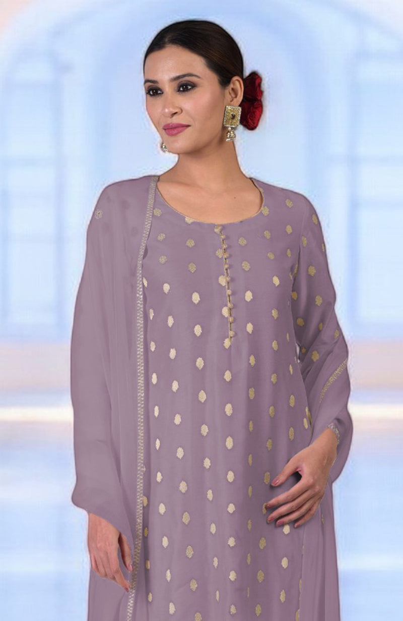 Elderberry Banarasi kurta set with gold polka dots and a matching dupatta.