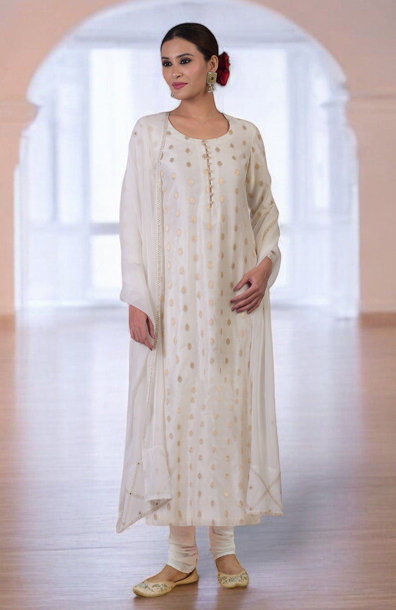 A woman models an Elderberry Banarasi Bootah & Aari Tilla Embroidered Kurta Set.