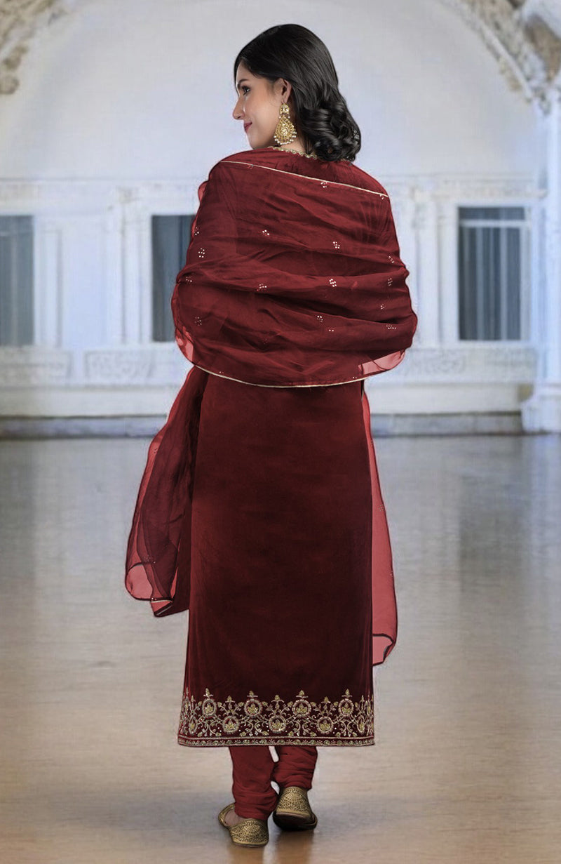 Maroon Zardozi hand-embroidered kurta set with a matching dupatta and churidar.