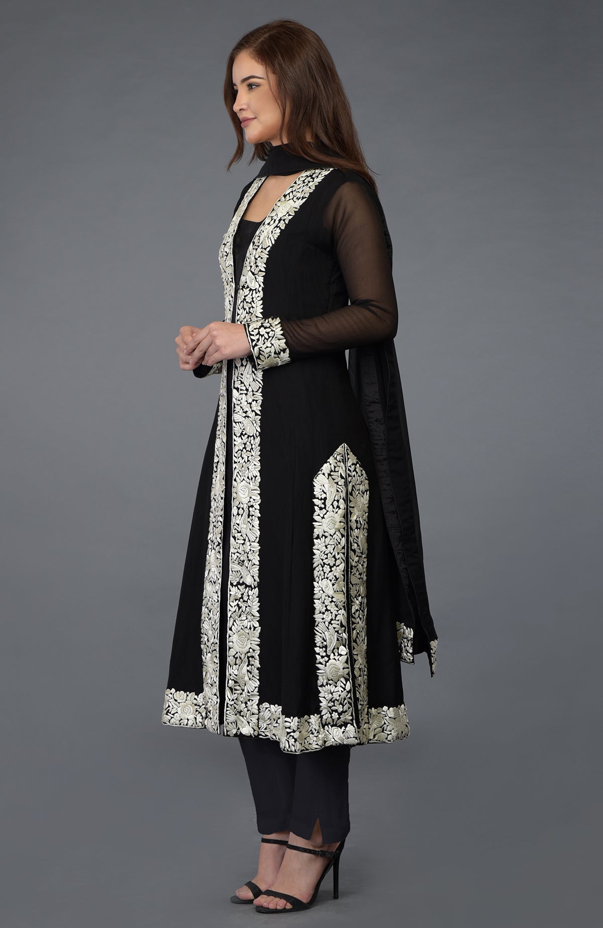 Black chiffon overlay suit with ivory Parsi Gara embroidery and matching dupatta and lowers.