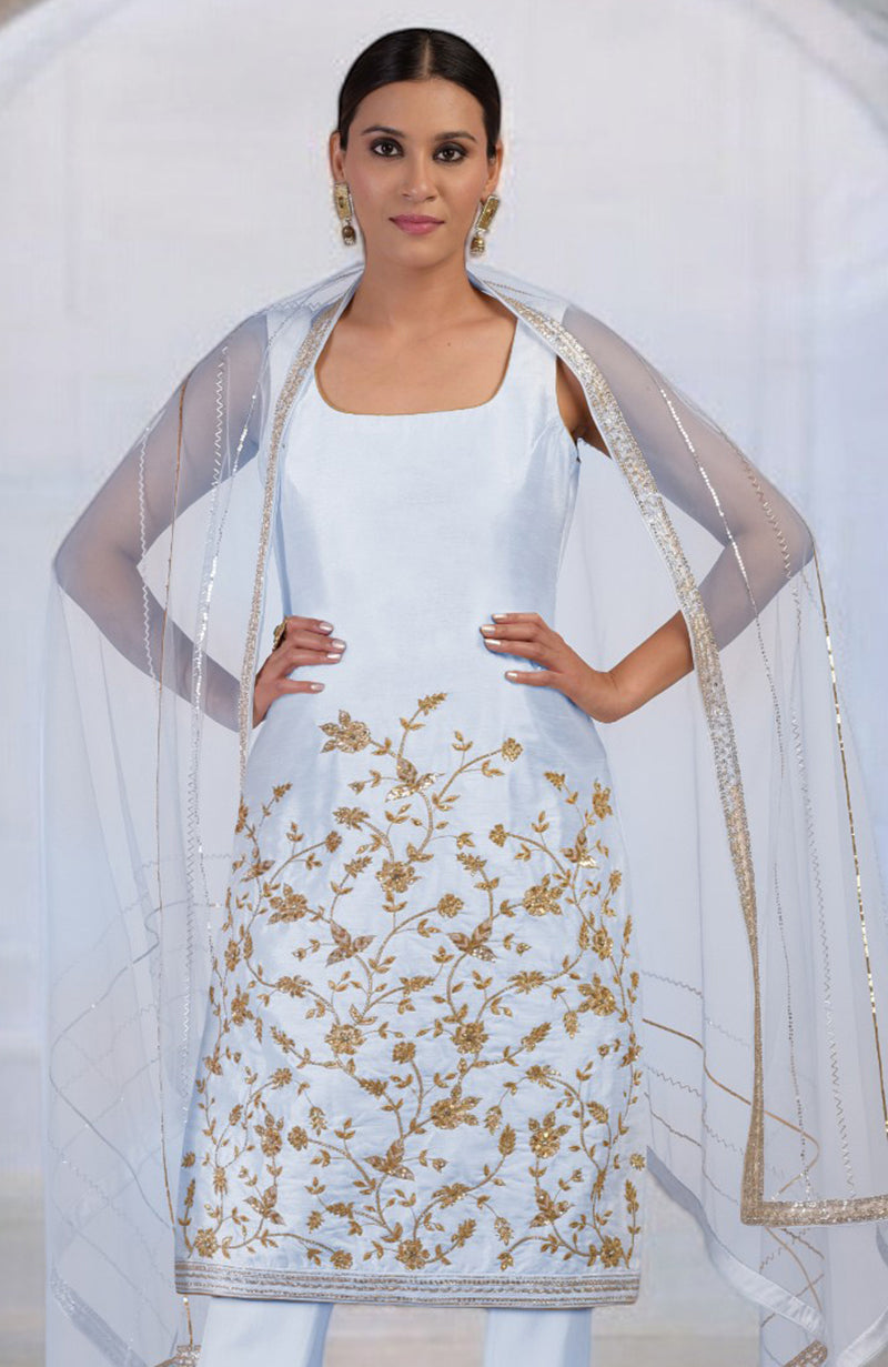 Ice blue hand-embroidered kurta set with a sheer dupatta.