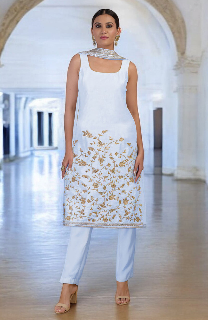 Ice blue hand-embroidered kurta set with gold floral patterns and matching pants.
