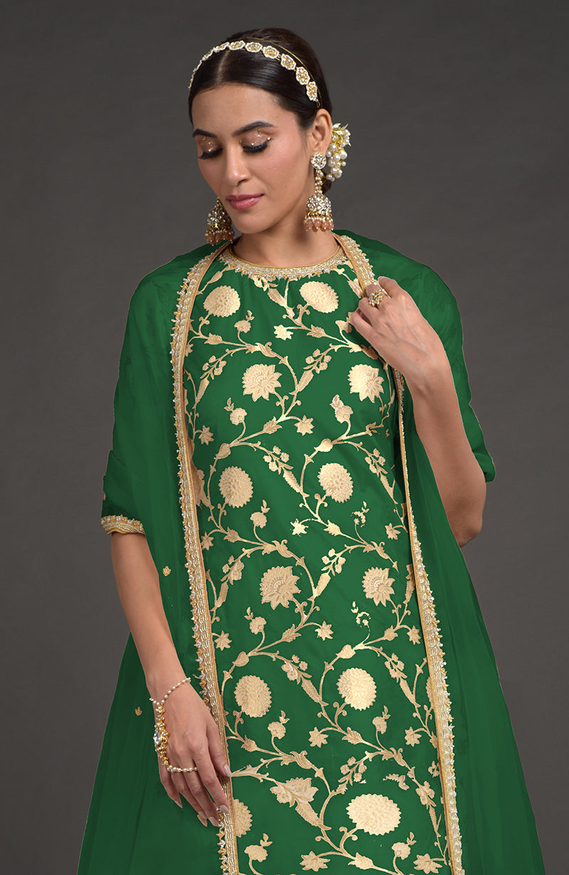 Emerald green Benarasi weave zardozi kurta set with gold embroidery.