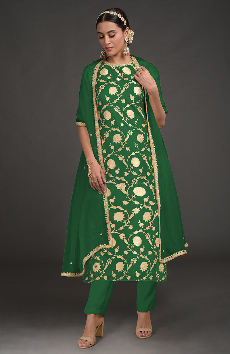 Emerald green Benarasi weave zardozi kurta set with gold embroidery.