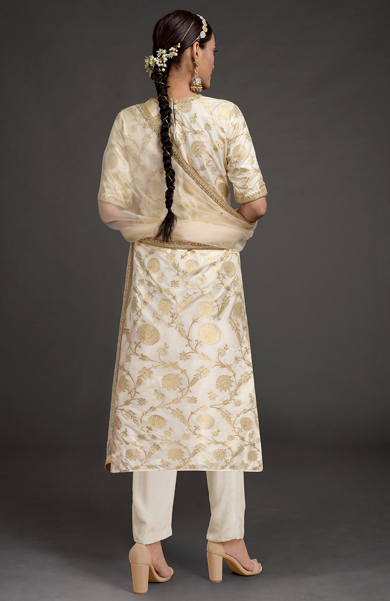 An ivory Benarasi weave zardozi kurta set with gold embroidery and a matching dupatta.