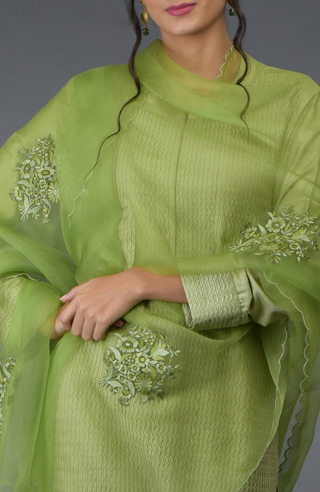 Pista green pintuck silk kurta set with embroidered organza silk dupatta.