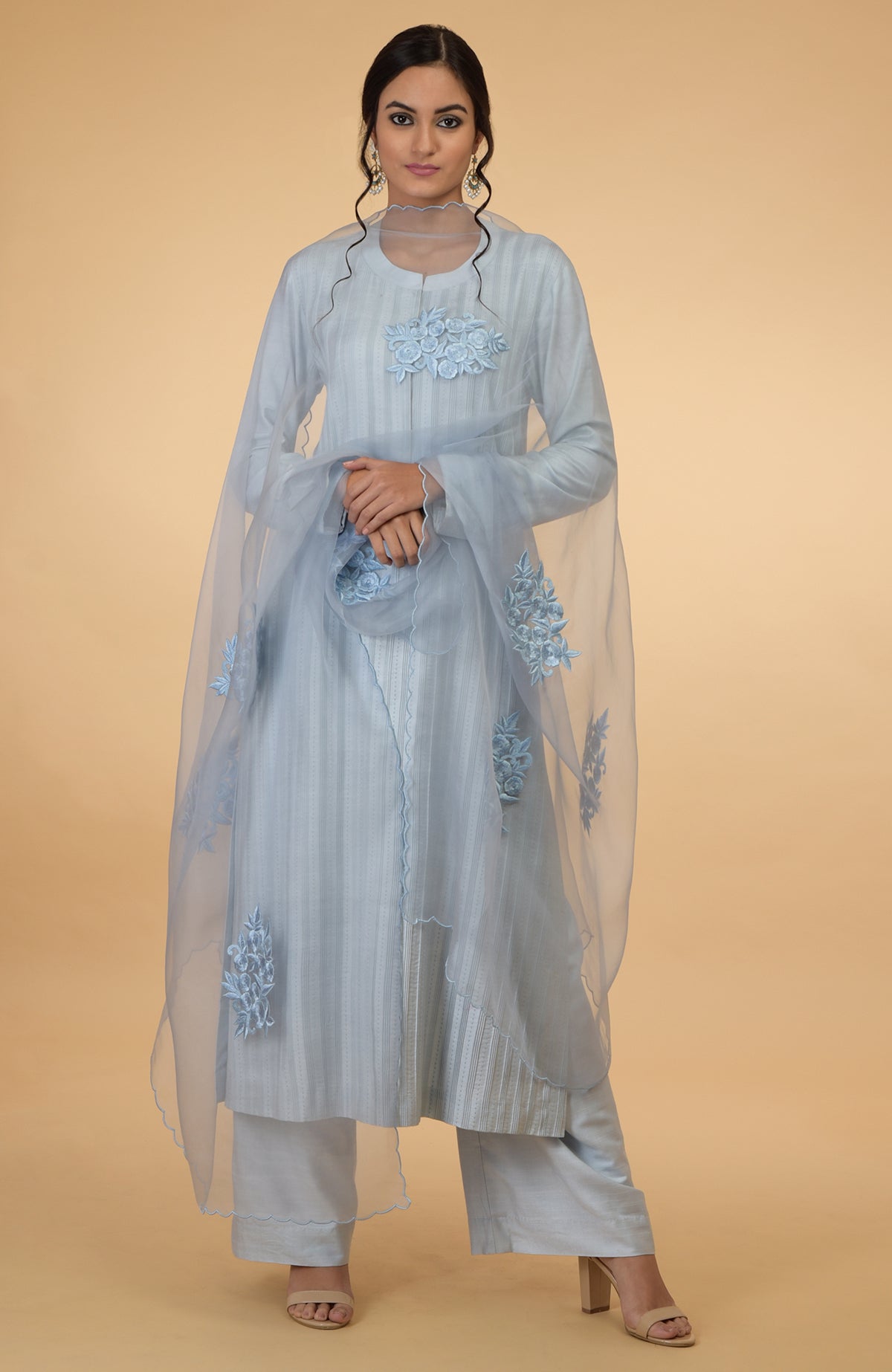 Powder blue pintuck and Kantha silk kurta set with embroidered organza dupatta.