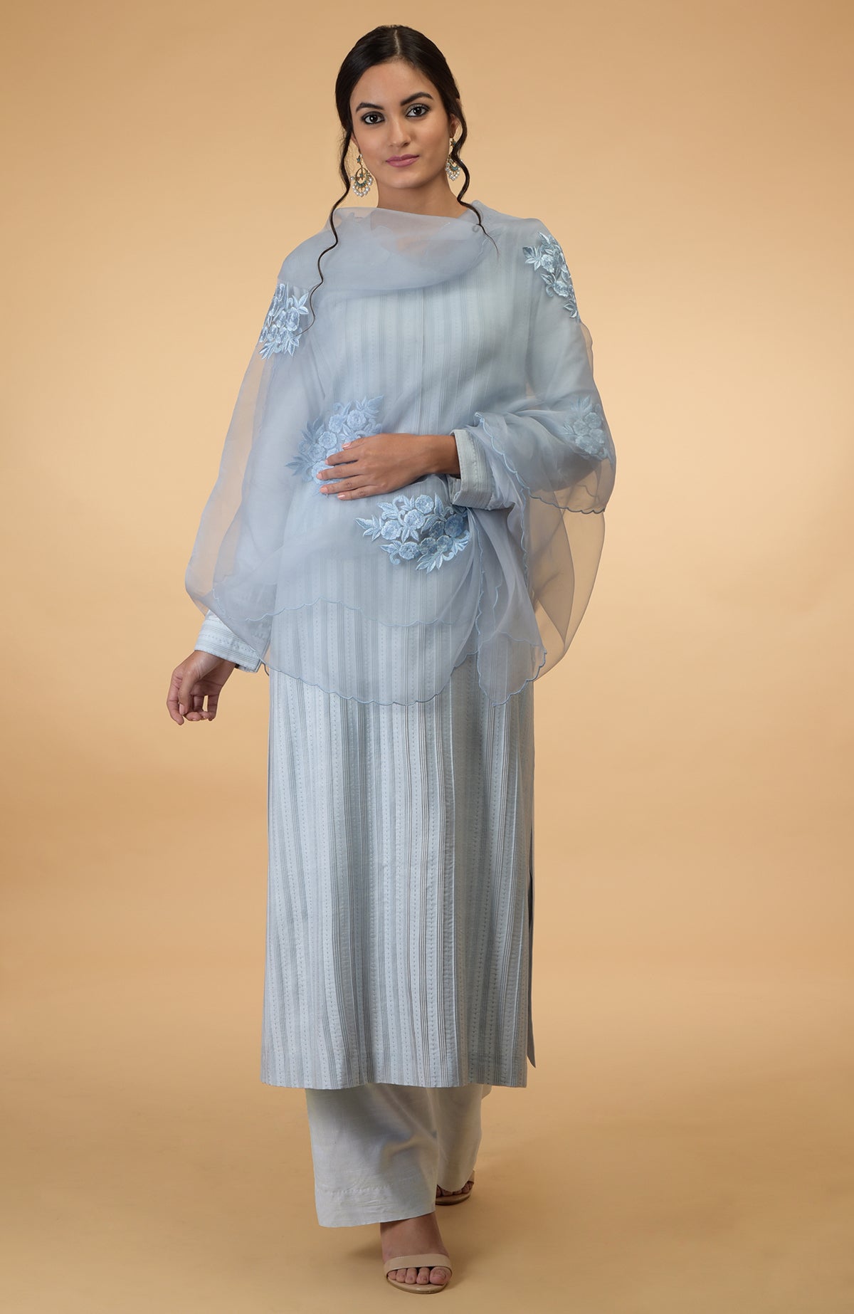 Powder blue pintuck and kantha silk kurta set with an embroidered organza dupatta.