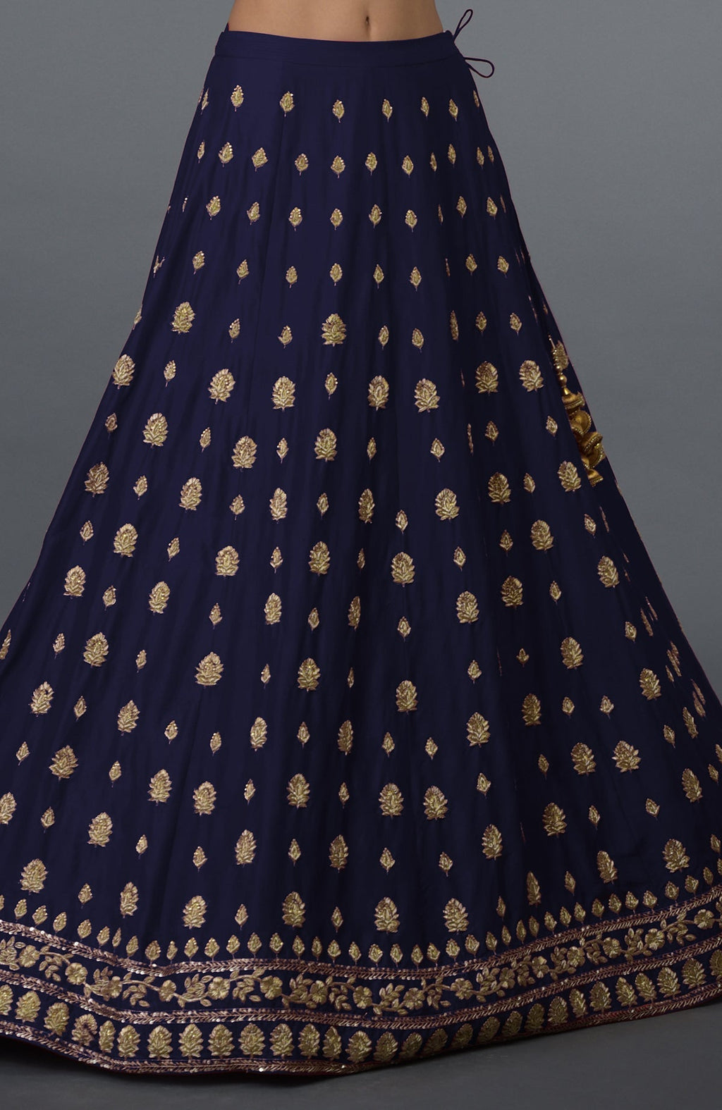 Eclipse blue pure silk skirt with gold zardozi and crystal hand embroidery.