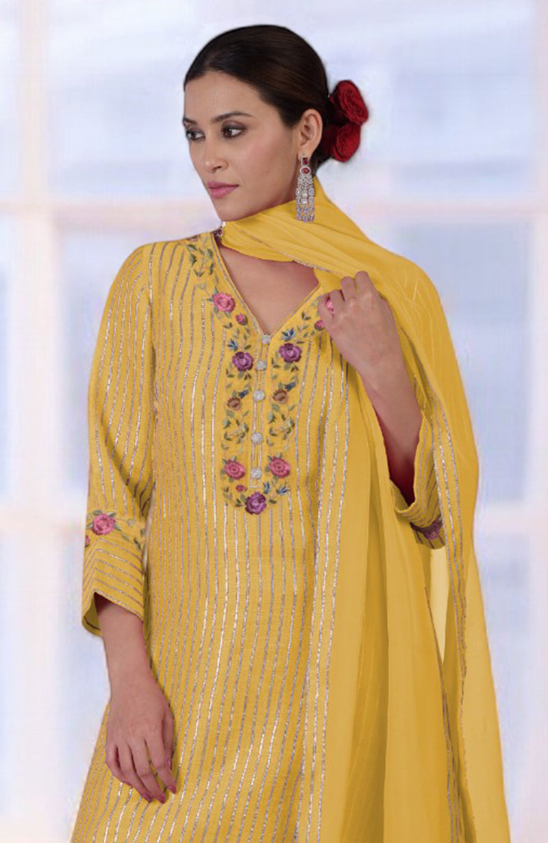 Calendula yellow silk linen suit with gota and Parsi Gara embroidery.