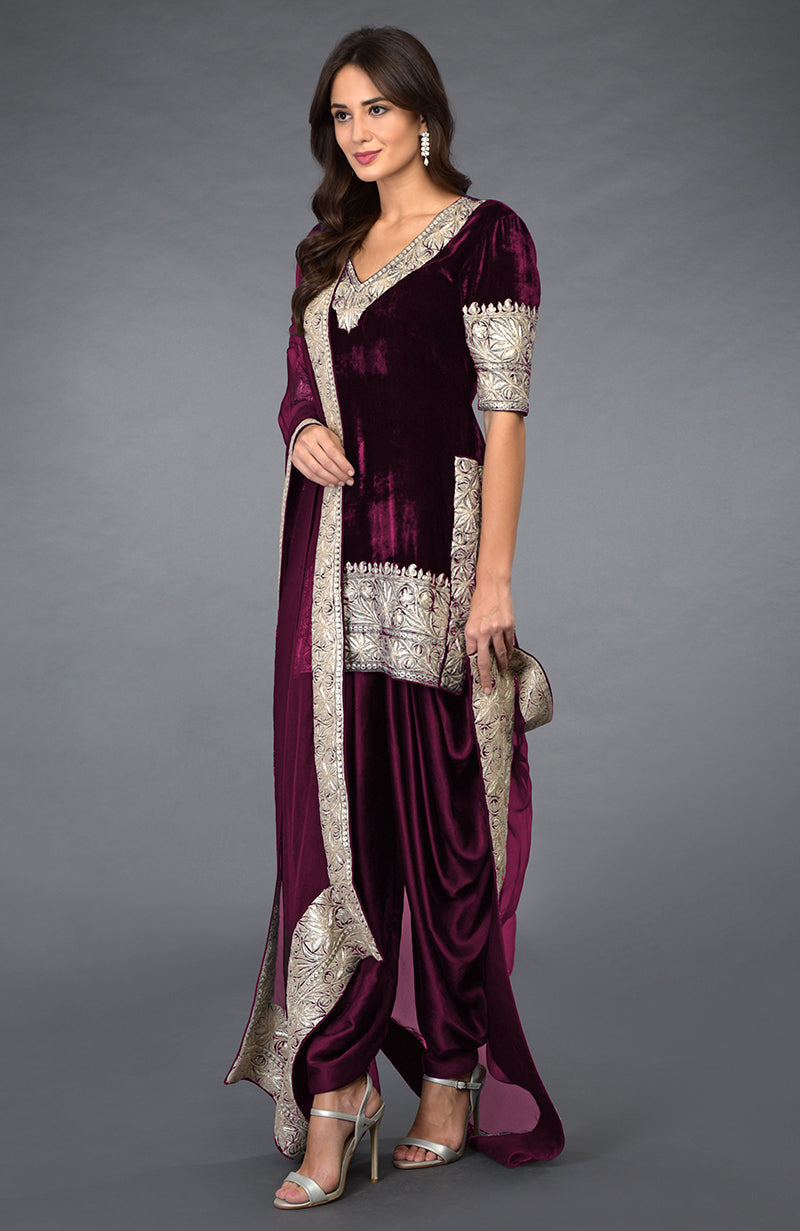 Burgundy velvet dhoti pants suit with silver Kashmiri Tilla embroidery.