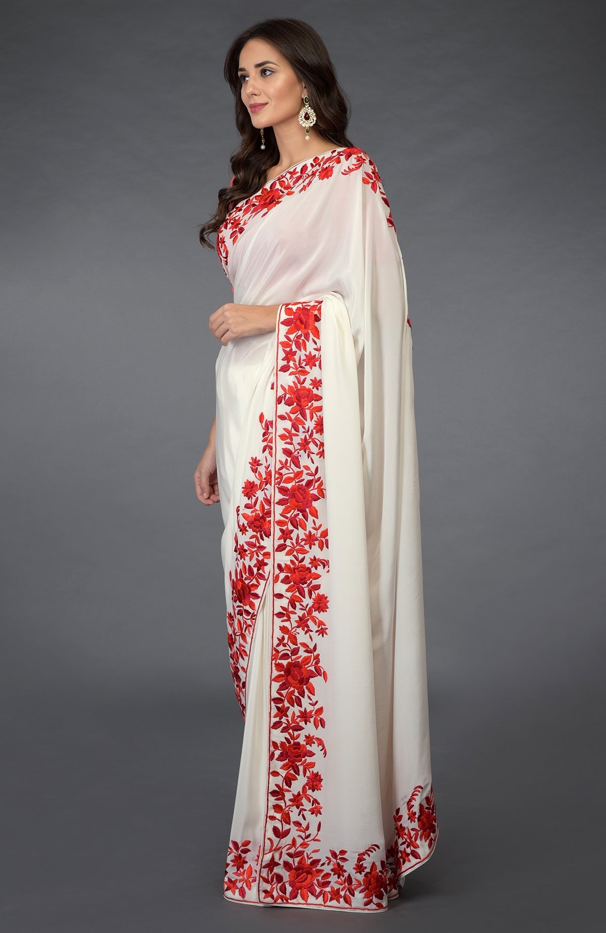 Ivory-red Parsi Gara hand embroidered saree with floral borders.